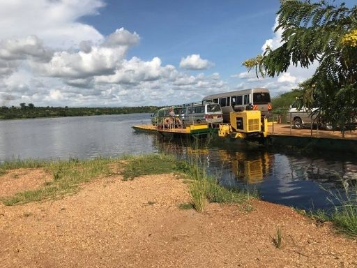 Loading the ferry and crossing to the northern bank of the Nile River. This leads to the heart of Murchison Falls National Park.